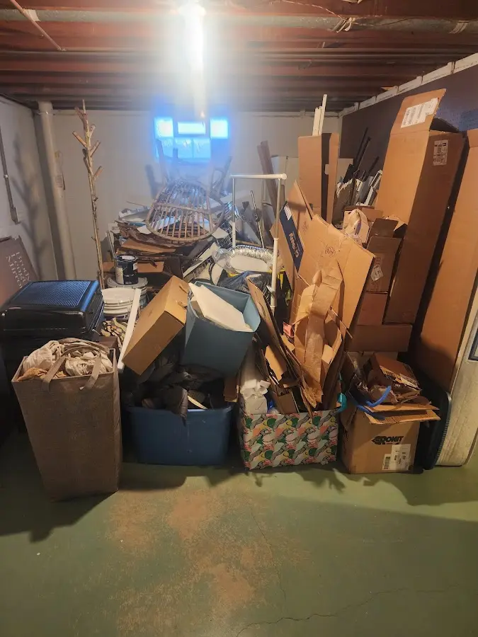 Roll-off dumpster container at job site for 6 Yard Dumpster Rental in Raymond